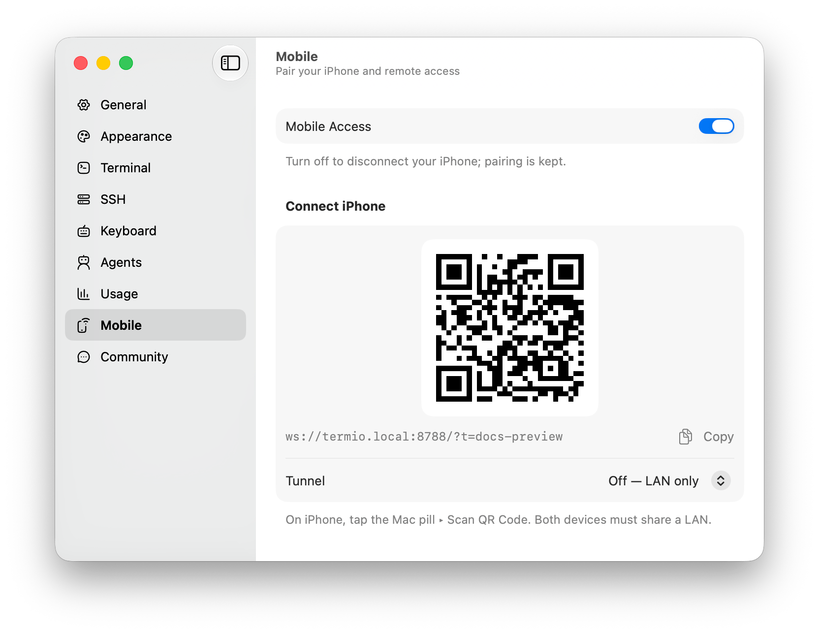 Fyolo Mobile settings on the Mac with Mobile Access enabled and a pairing QR code ready for an iPhone